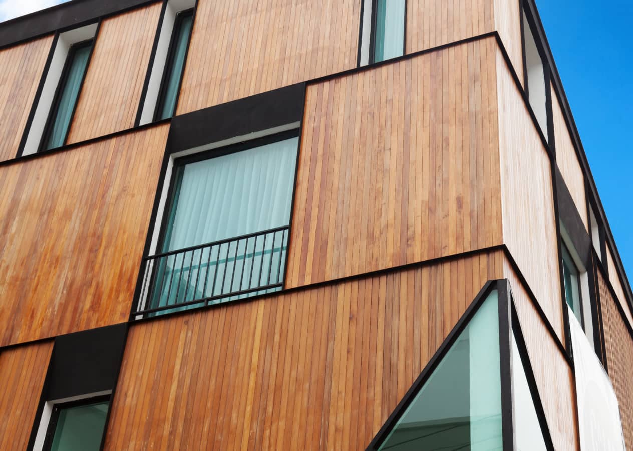 Corner view of a building with attractive wooden cladding